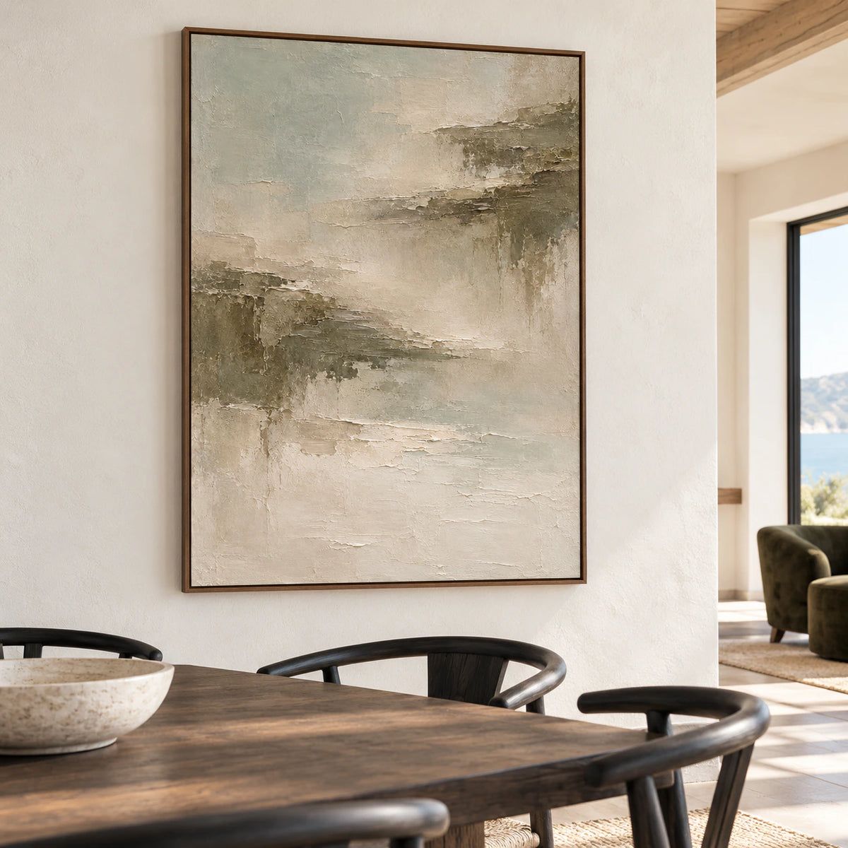 Tonal Fault anchoring a refined dining room with a long table and understated furnishings.