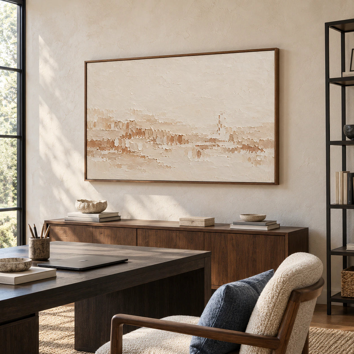 Tonal-Stitch artwork in an airy home office with a dark desk, open shelving and bright side light.