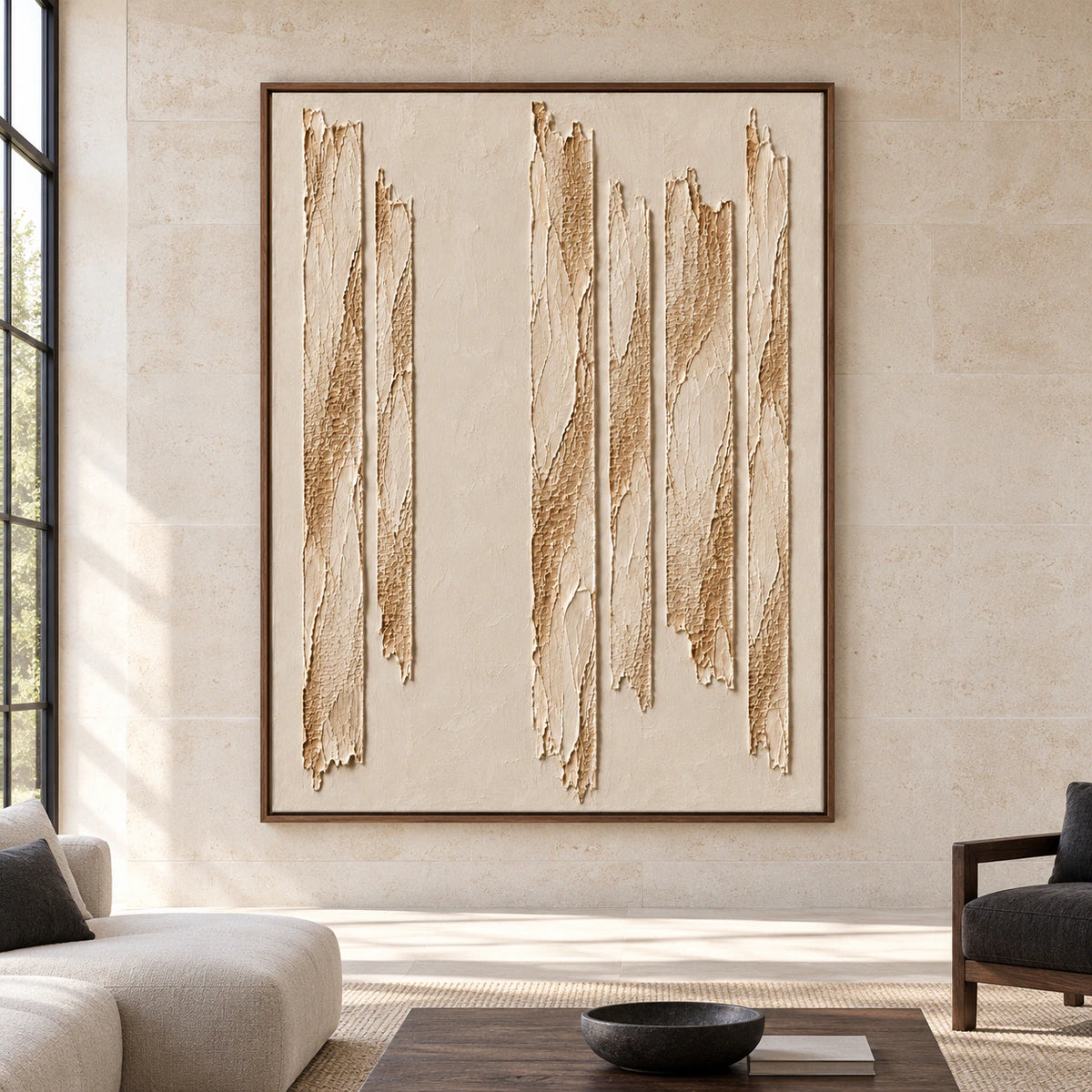 Straight-on view of Torn-Cadence on a broad pale limestone wall in a spacious, sunlit room with charcoal and dark wood furnishings.