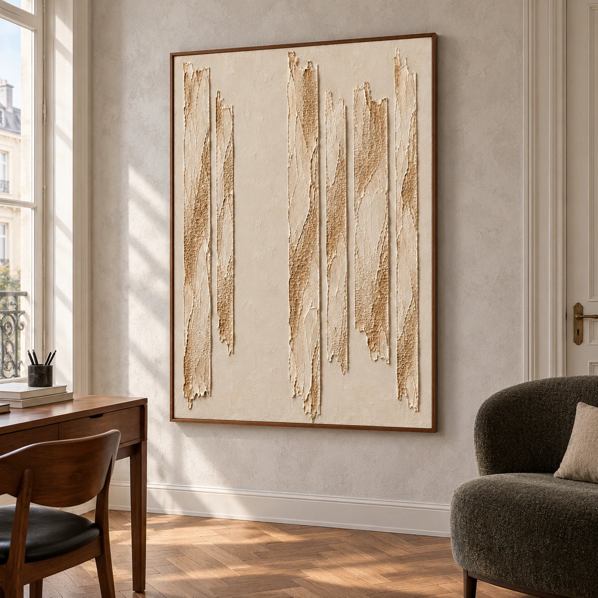 Left-oblique view of Torn-Cadence on a pale gray plaster wall beside a walnut desk and dark upholstered reading chair.