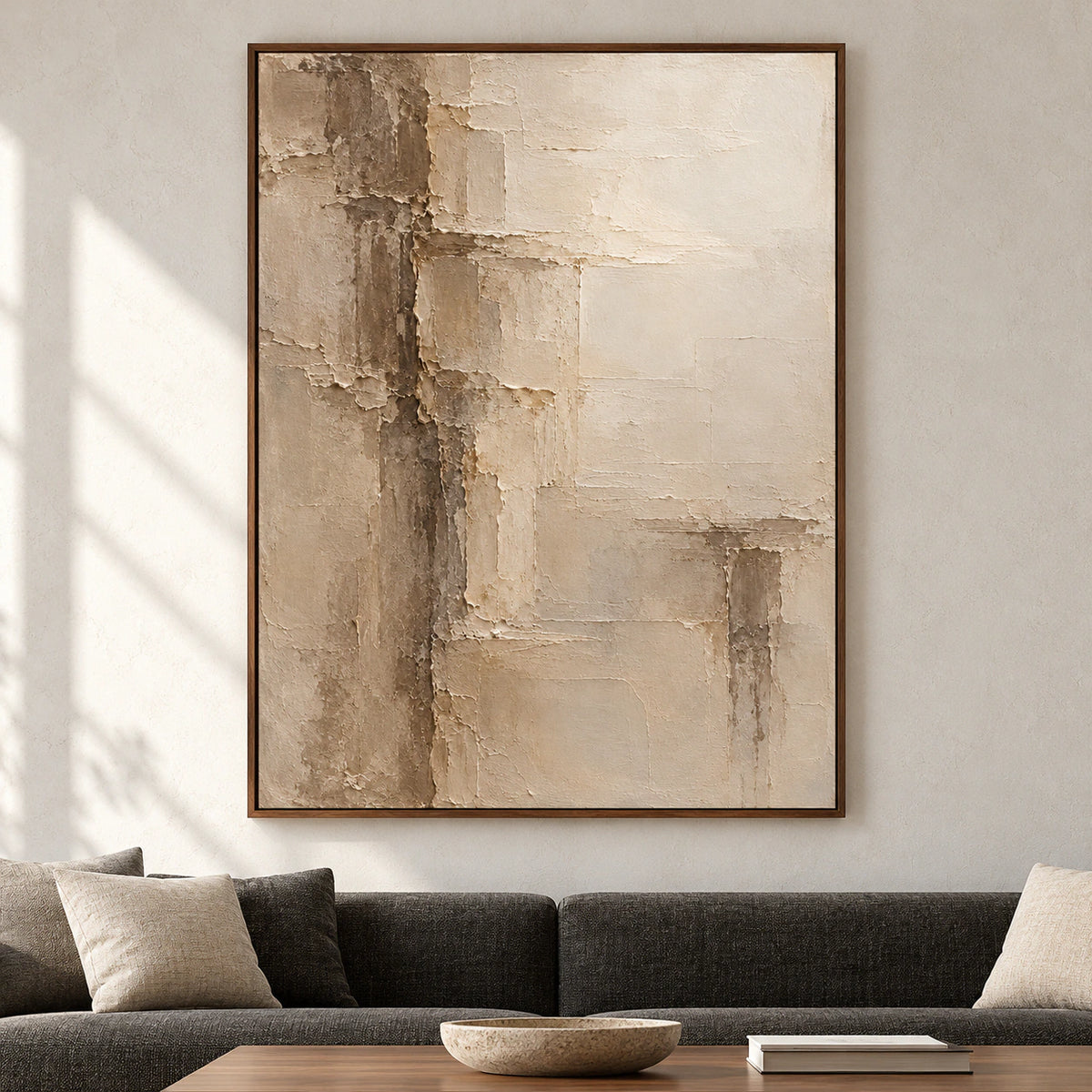 Torn-Meridian shown straight-on on a pale stone wall in a spacious, sunlit living room with charcoal and natural wood furniture.