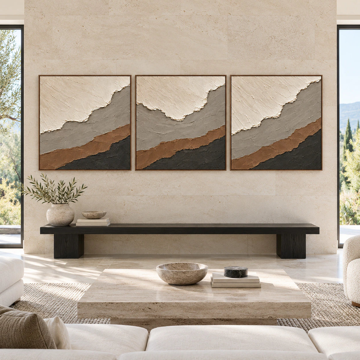 Large straight-on view of the Tundra-Contour triptych, three square framed canvases displayed side by side in a spacious interior.