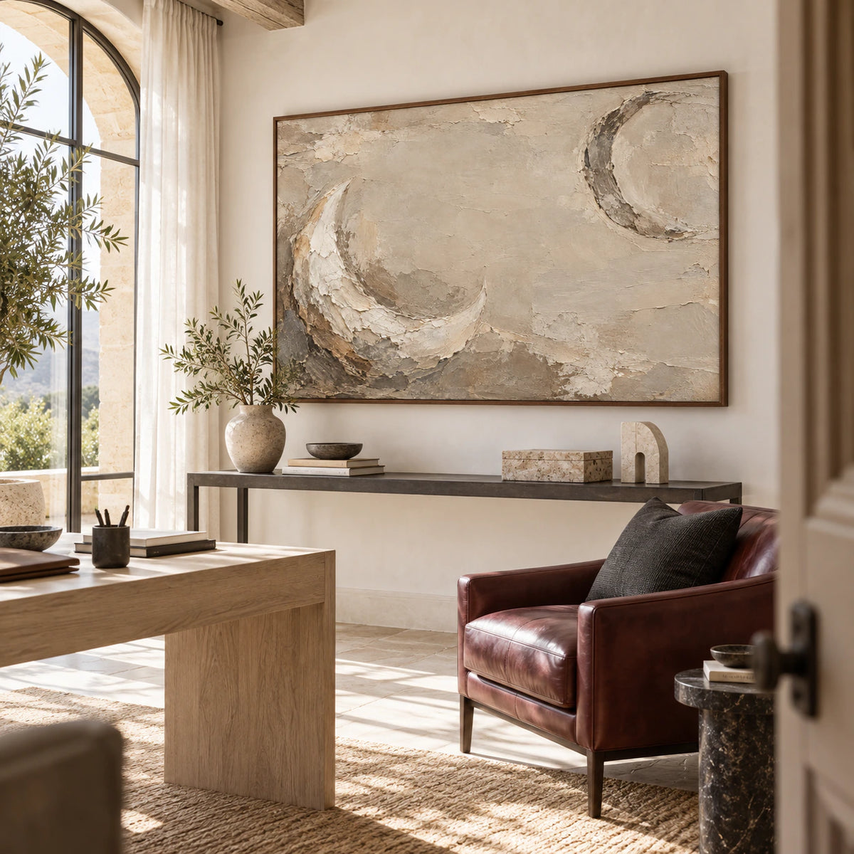 Umber-Arc as the focal artwork in an airy home office reading space.