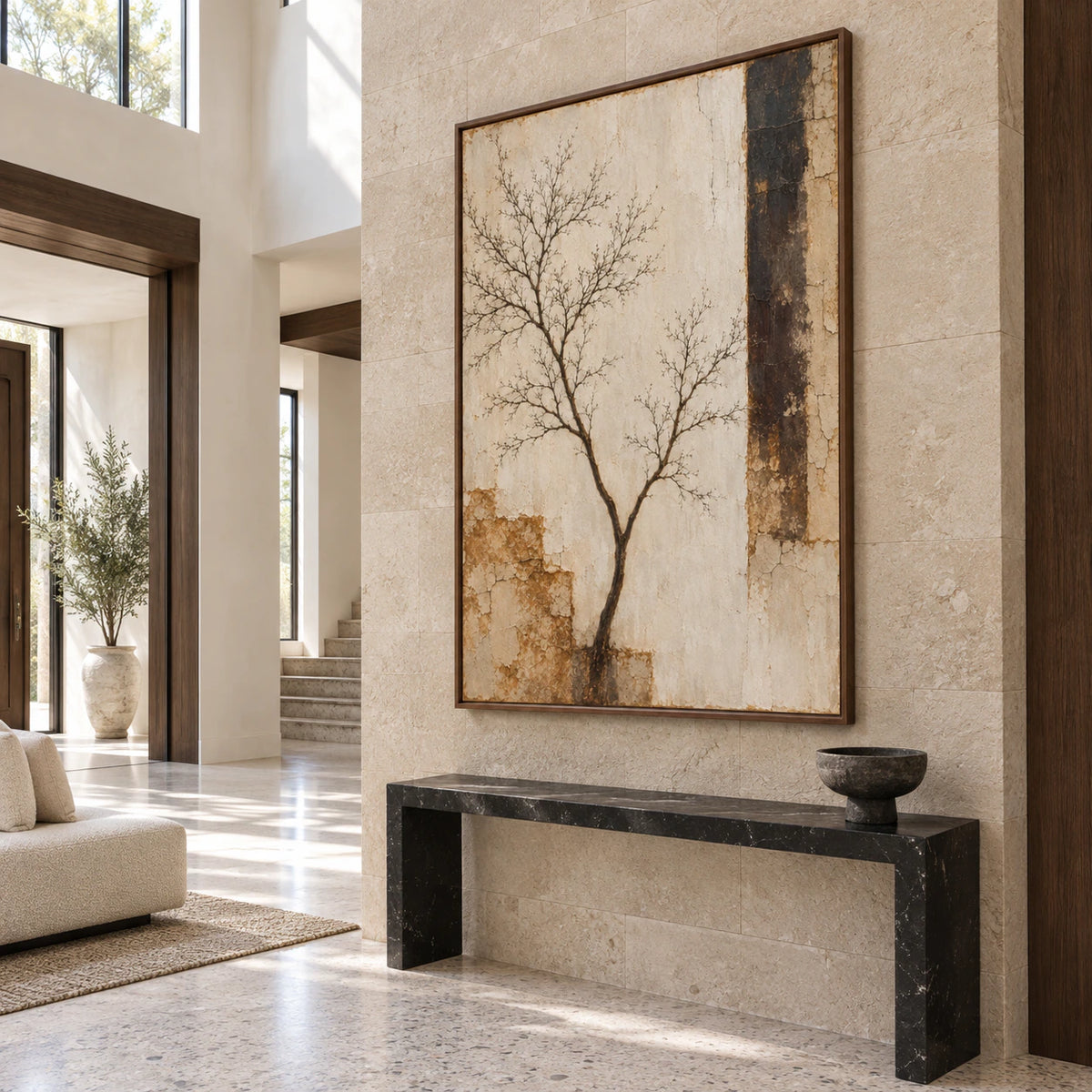 Gallery-scale foyer centered on the tall vertical Umber-Branch artwork.
