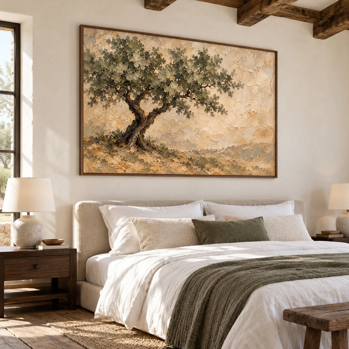 Horizontal tree painting above a low bed with white linen and dark timber details, viewed slightly from the left in soft daylight.