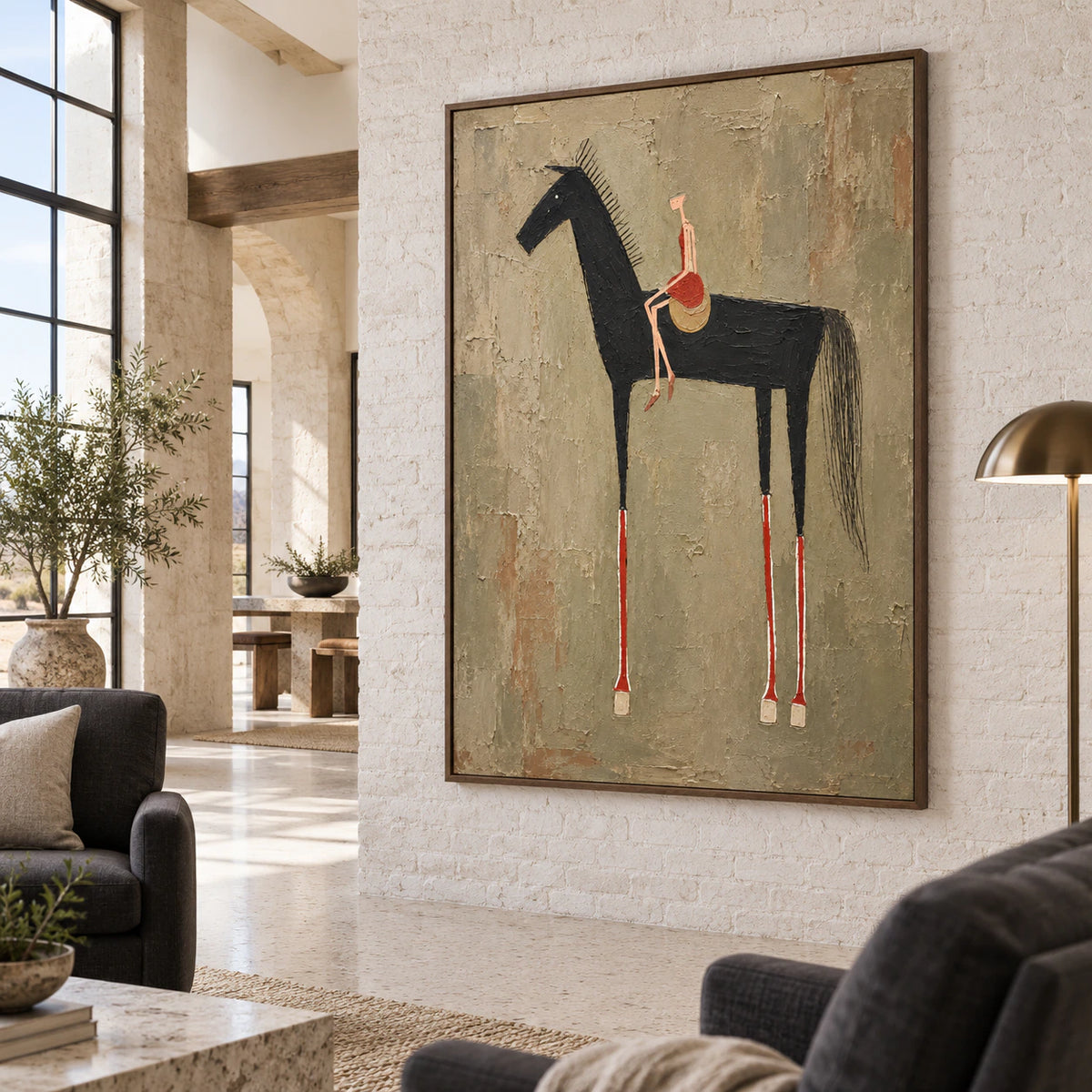 Umber-Canter anchoring an open, daylight-filled hospitality loft interior.