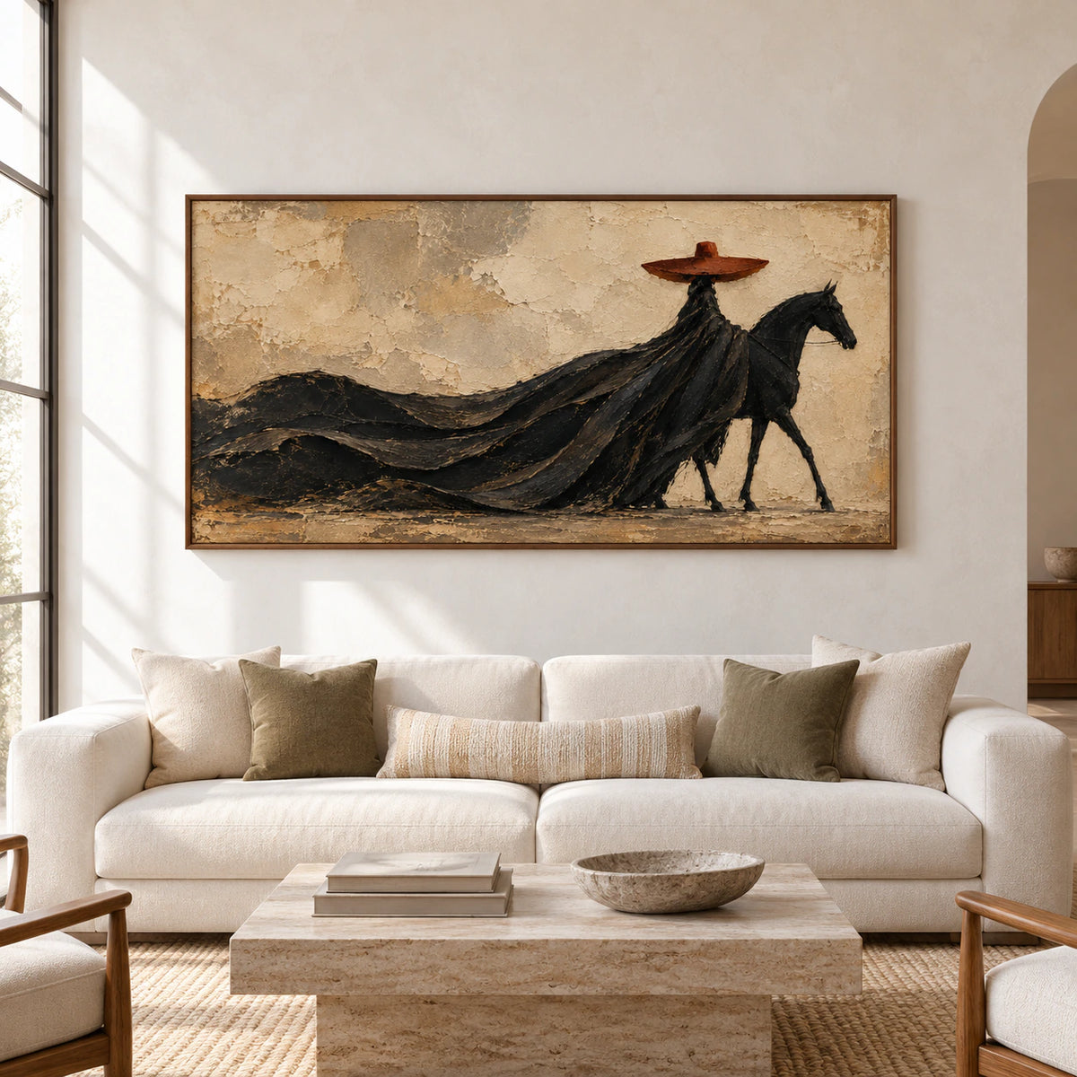Large horse and rider painting viewed straight-on on a pale plaster wall in a spacious room with restrained furniture and natural daylight.