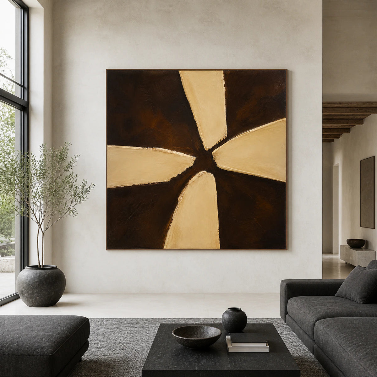 Large square umber and ochre abstract painting displayed straight-on in a bright architectural living space.