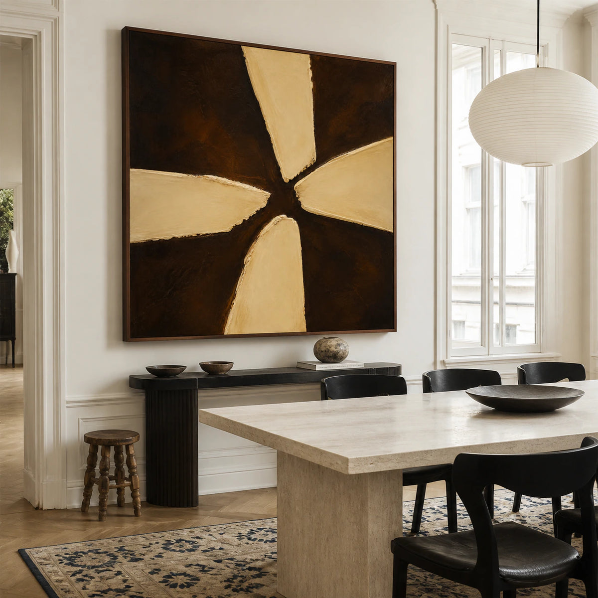 Square textured umber and ochre abstract painting in a refined daylight dining room.