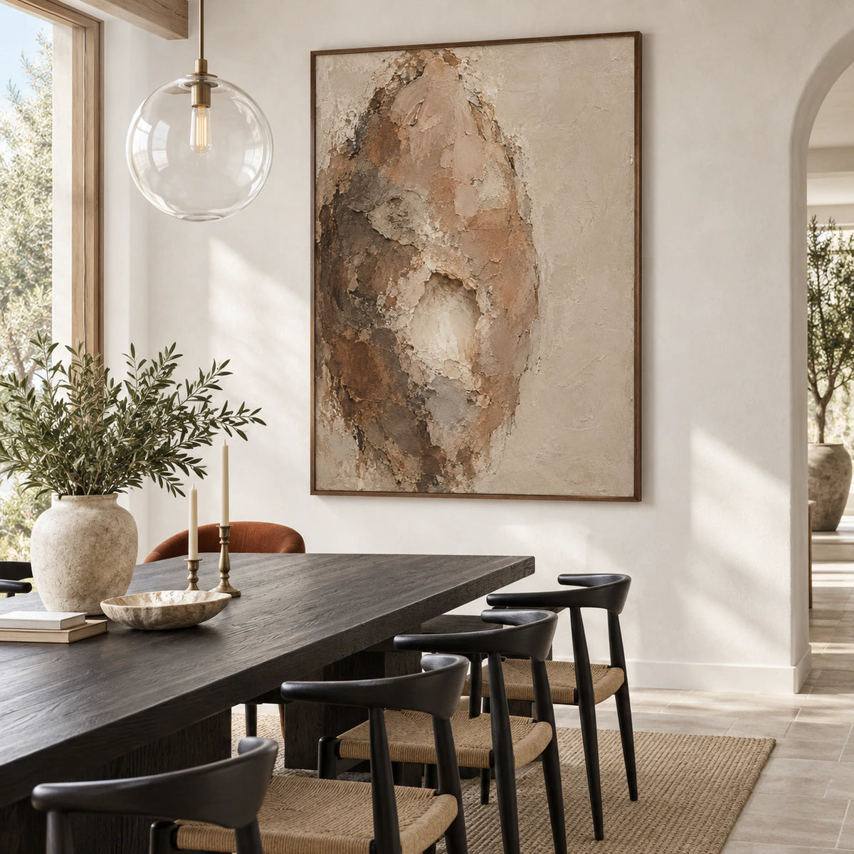 Refined dining room with the large vertical textured abstract painting as the central wall feature.