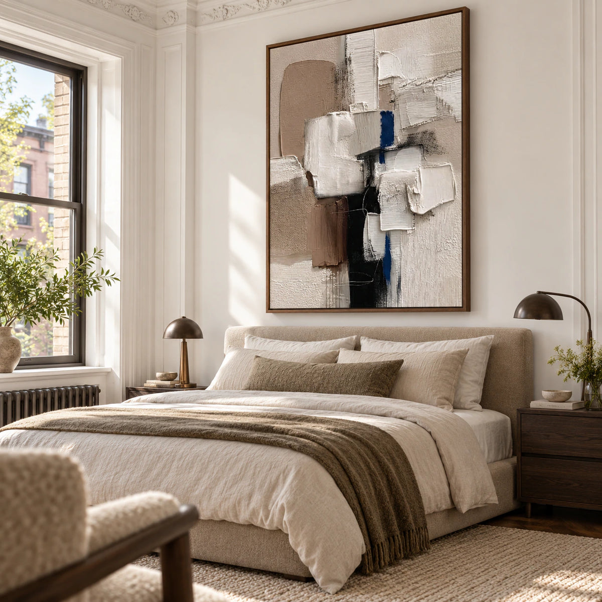 Vertical textured abstract painting above a low bed in a quiet bedroom.