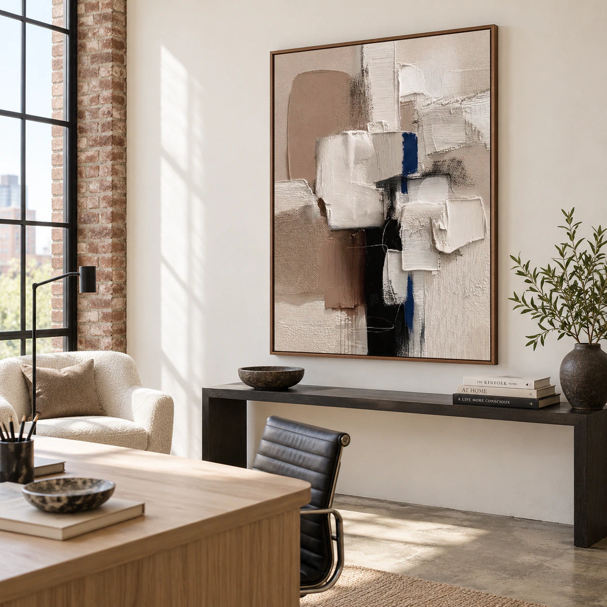 Vertical textured abstract painting in an airy reading and home office space.