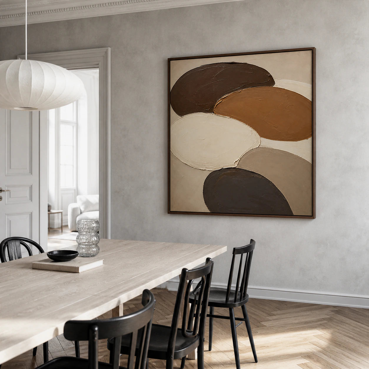 Umber-Orbits displayed prominently in a refined daylight dining room.