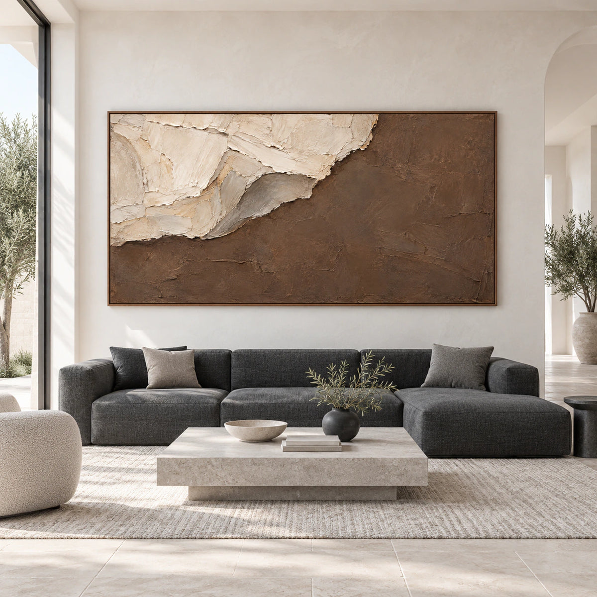 Large textured umber and ivory abstract painting shown straight-on in a spacious architectural interior.