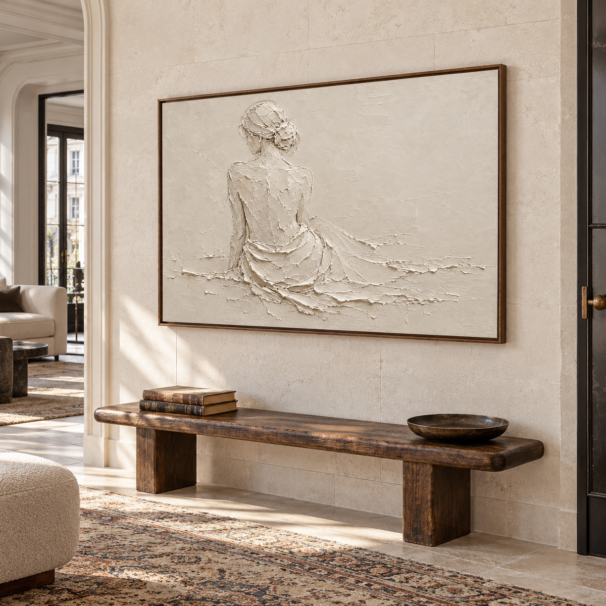 Large seated-figure painting commanding a bright, spacious foyer with architectural stone walls.