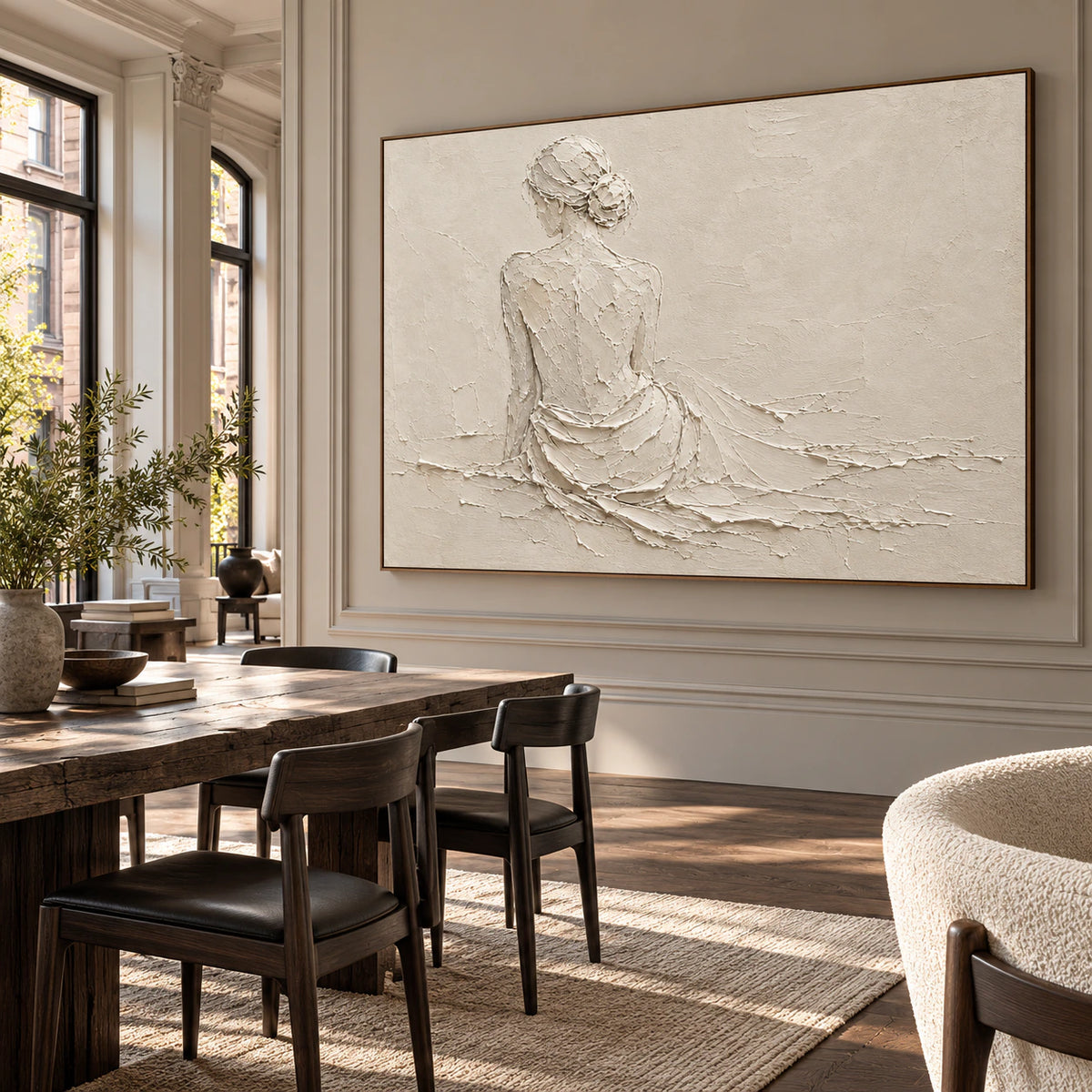 Sculptural ivory figure painting featured at large scale in an expansive loft interior.