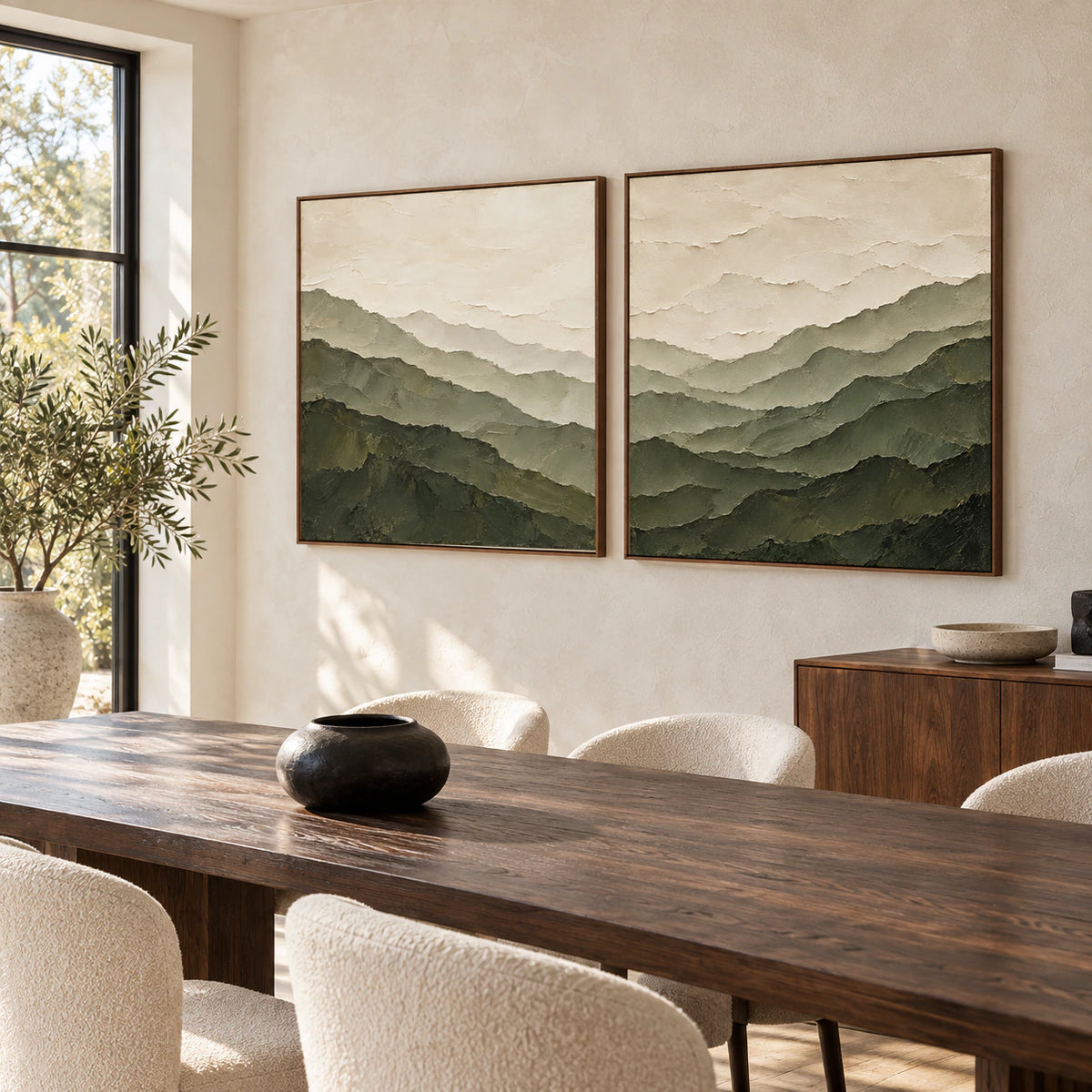 Textured square mountain diptych in a refined daylight dining room with a sculptural wood table.