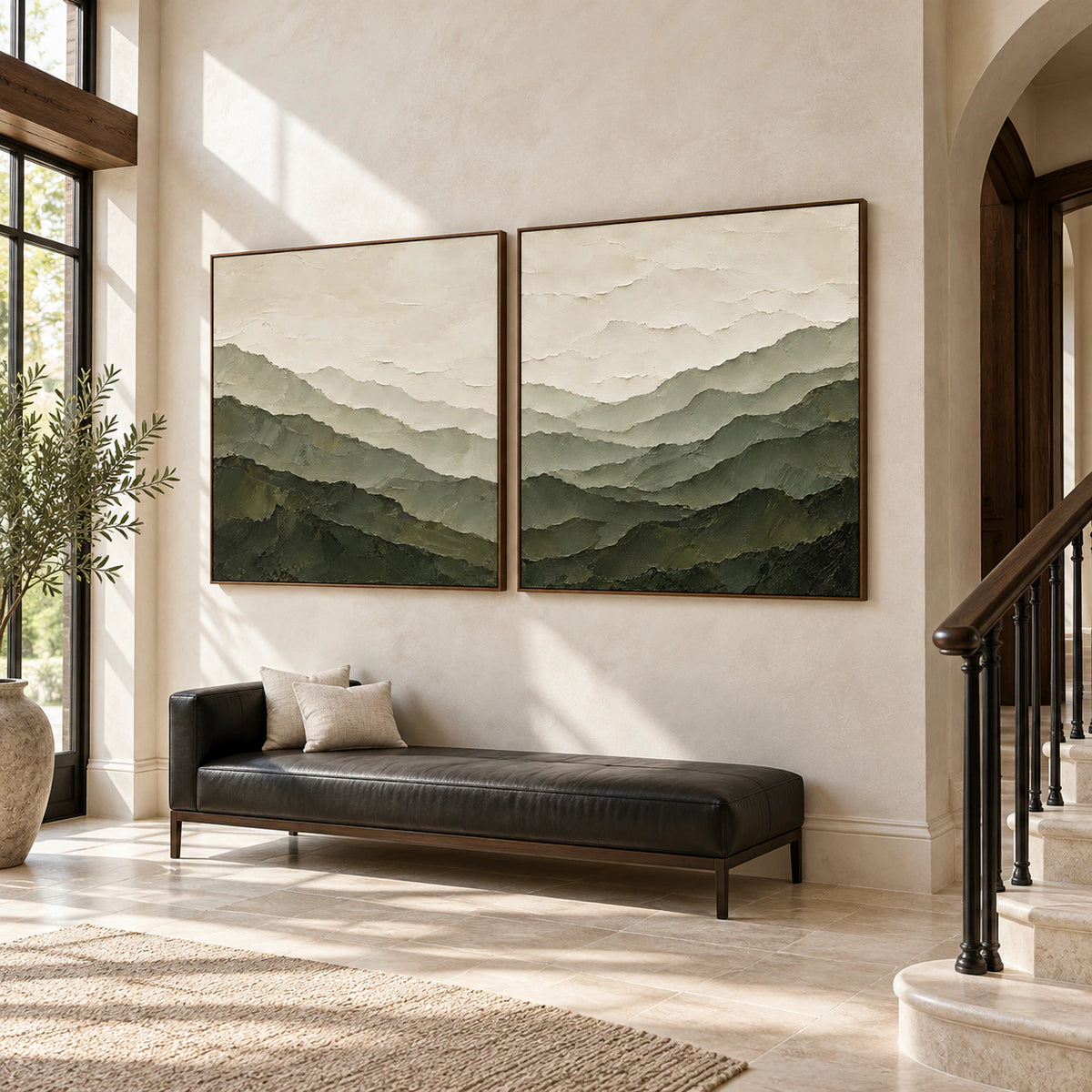 Large framed mountain diptych in a gallery-scale foyer with bright shadow detail.