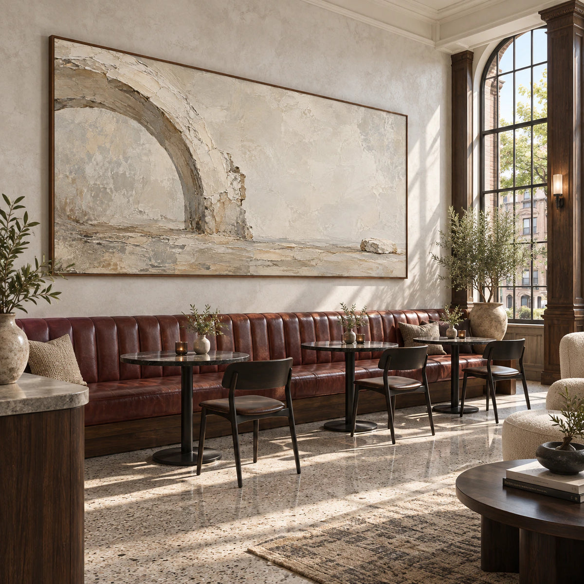 Weathered-Arc displayed prominently in an expansive sunlit hospitality loft.