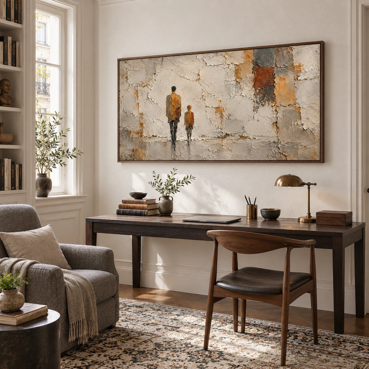 Textured painting of two figures set against fractured ivory plaster as the focal point above a simple desk in an airy home office with daylight.