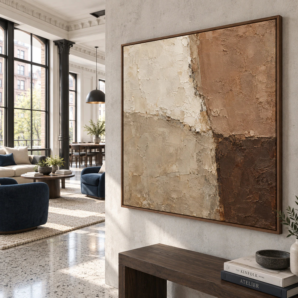 Square abstract artwork displayed at large scale in an expansive loft hospitality interior.