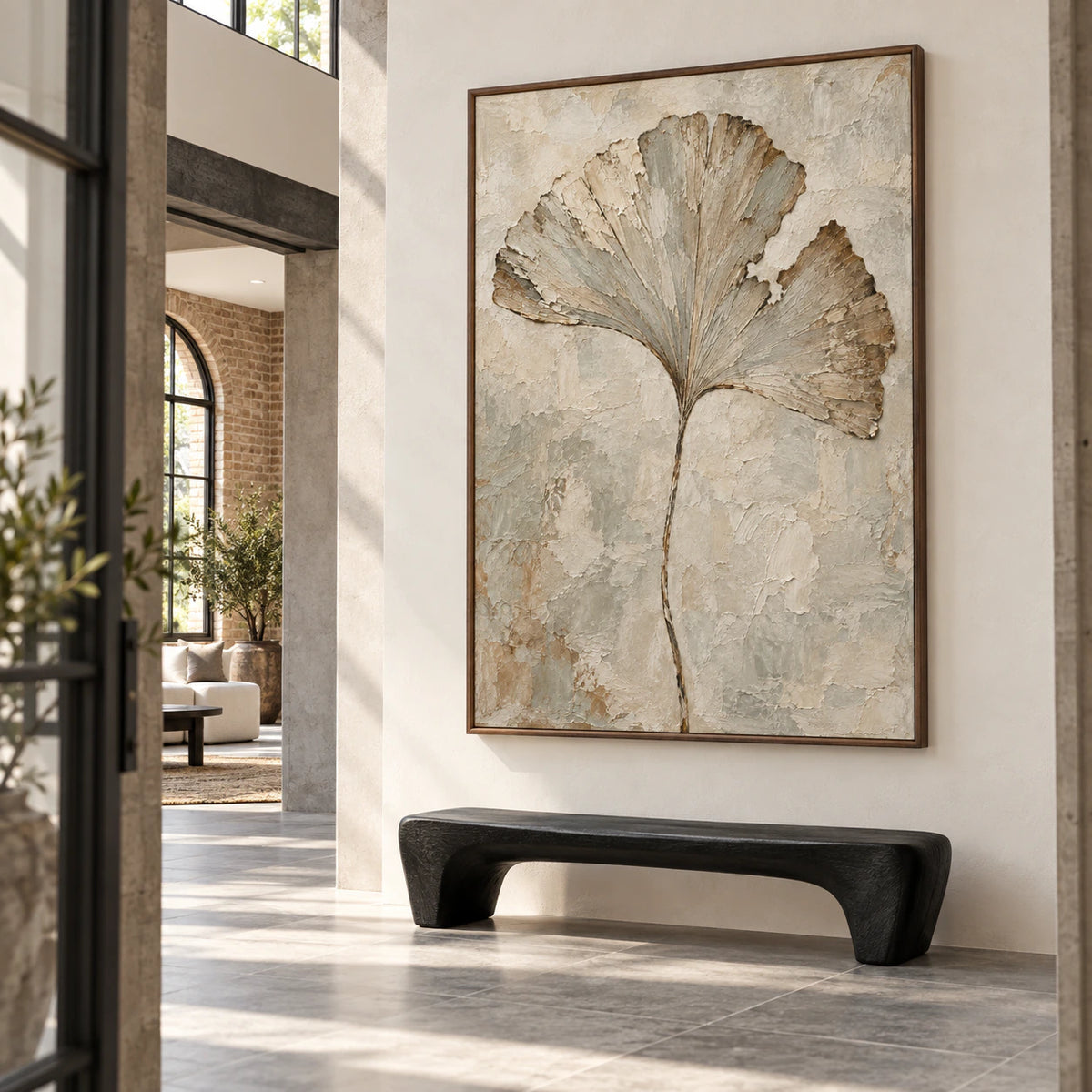 Large botanical artwork in a bright gallery-scale stone foyer.