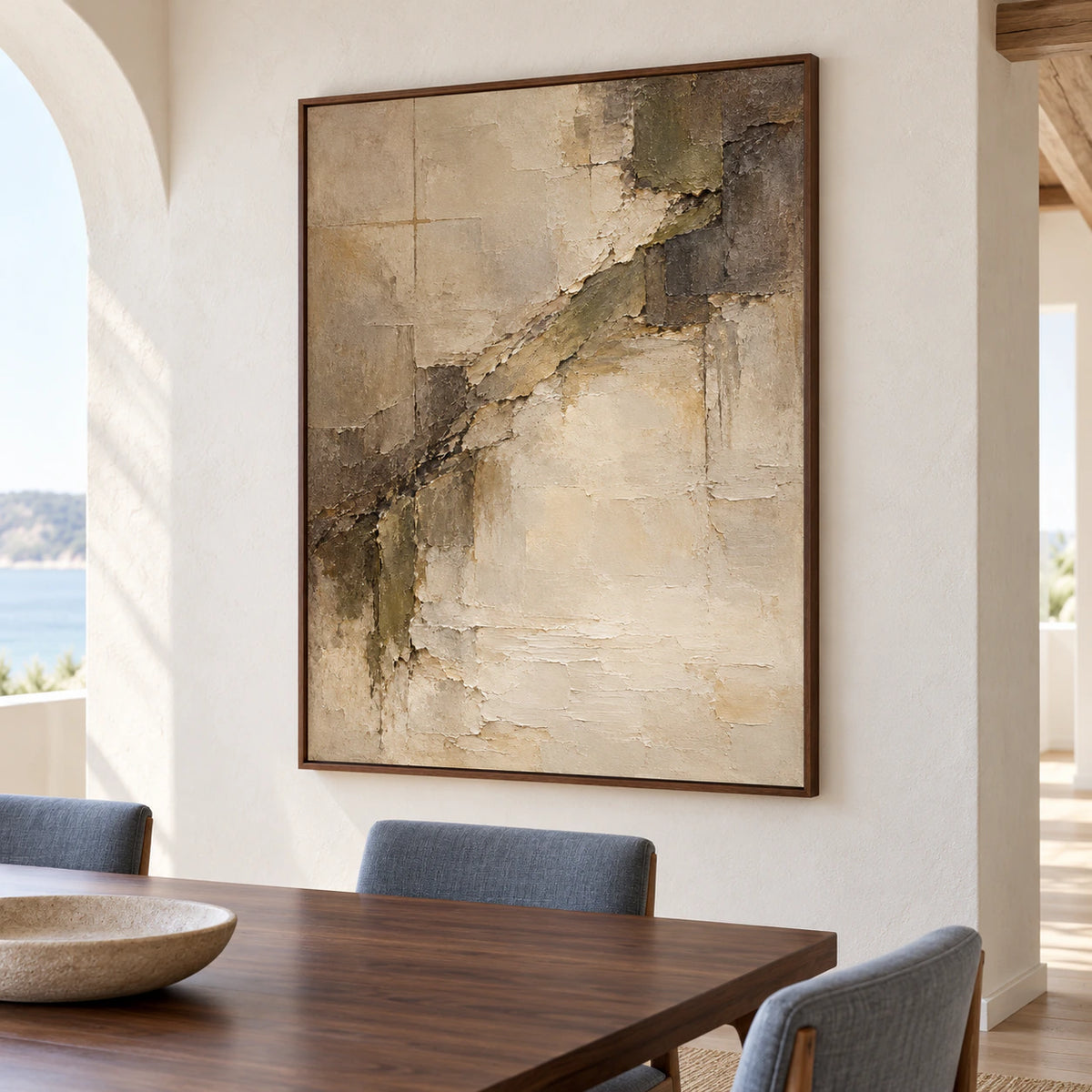 Large vertical abstract painting anchoring a refined dining room with a long table and understated furnishings.