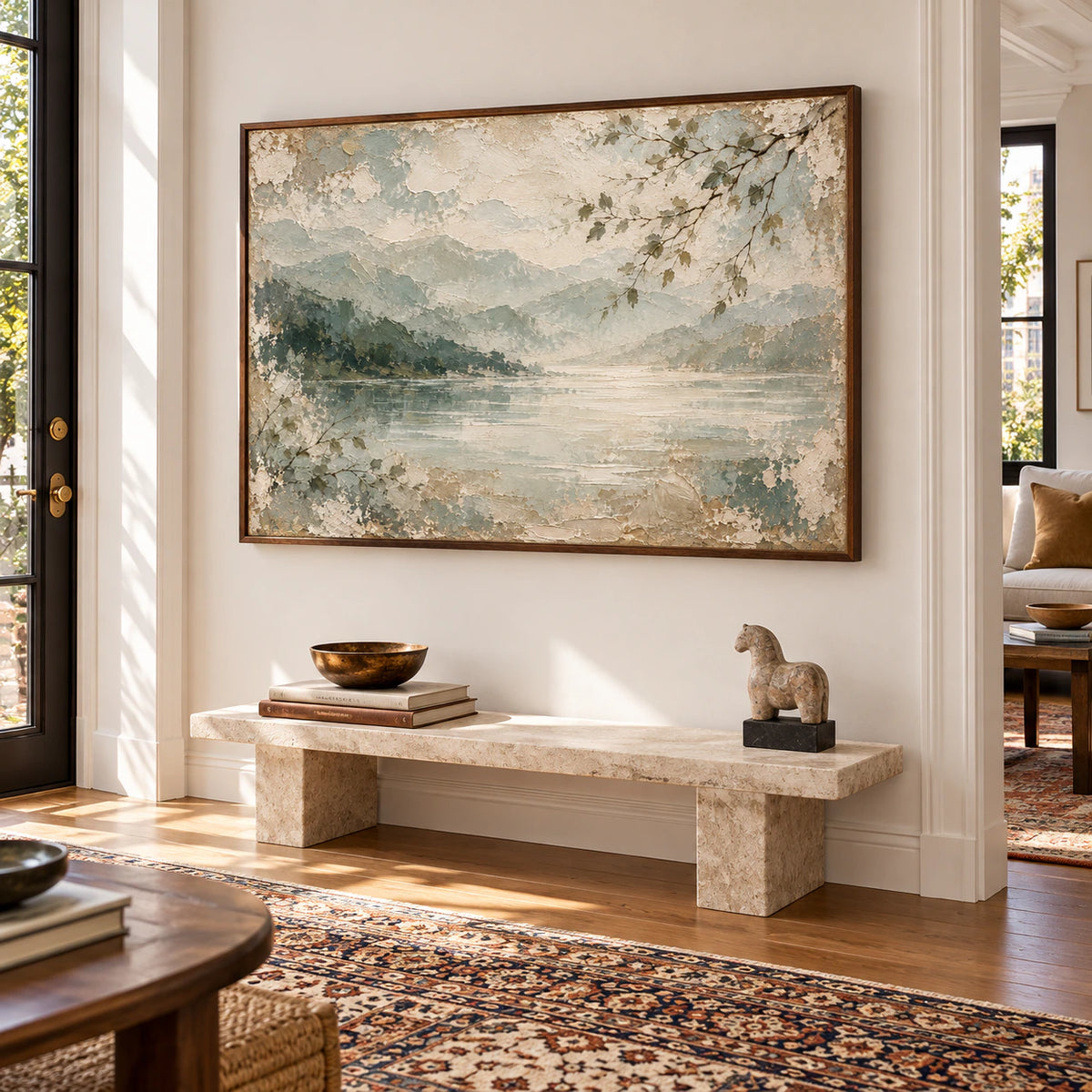 Willow-Inlet artwork commanding the wall of a bright gallery-scale foyer with a stone bench and open circulation space.